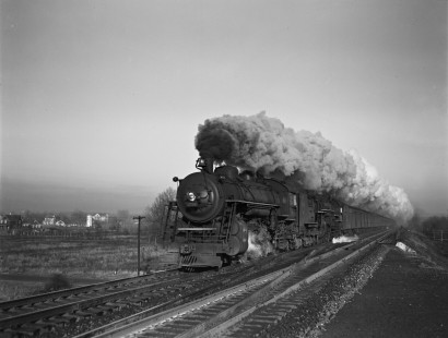 Erie Railroad 4-6-2 steam locomotives nos. 2716 and 2945 double heading on eastbound passenger train no. 6, "The Lake Cities," running about thirty minutes late at Passaic Junction, Elmwood Park, (formerly known as East Paterson), New Jersey, on November 21, 1940. Photograph by Donald W. Furler, © 2017, Center for Railroad Photography and Art, Furler-03-029-04