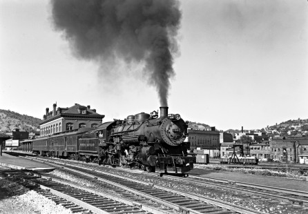 Western Maryland Railway 4-6-2 steam locomotive no. 208 with train no. 9 departs the station at Cumberland, Maryland en route to Elkins, West Virginia in August of 1952. Furler-22-080-02; © 2017, Center for Railroad Photography and Art