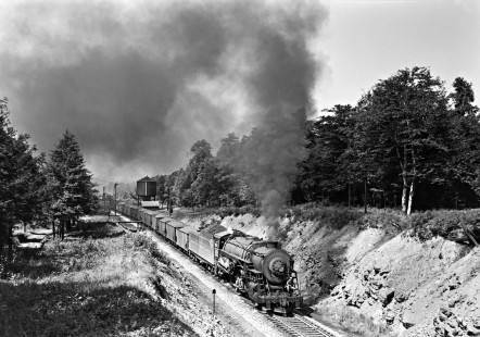 Western Maryland Railway steam locomotive no. 1118 pulls an eastbound coal train of 49 hoppers at Deal, Pennsylvania in September of 1952. The train is bound for Knobmount Yard near Cumberland, Maryland for weighing. Furler-22-086-01; © 2017, Center for Railroad Photography and Art
