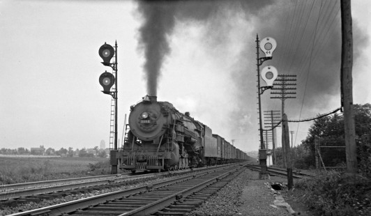 Reading Company 2-10-2 steam locomotive no. 3014 pulling a westbound freight train past Hall Disc ("banjo") signals at Allentown, Pennsylvania, circa 1940. Photograph by Donald W. Furler,  © 2017, Center for Railroad Photography and Art, Furler-24-090-04