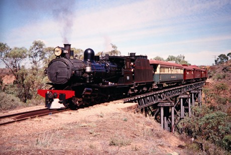 Pichi Pichi Railway steam locomotive no. 186  leads a tourist excursion of the original  "Ghan" train route between Port Augusta and Quorn in Woolshed Flat , South Australia, Australia, on April 13, 2003. The heritage line is operated and maintained by the Pichi Richi Railway Preservation Society. Photograph by Fred M. Springer, © 2014, Center for Railroad Photography and Art. Springer-Australia-NZ(2)-03-33