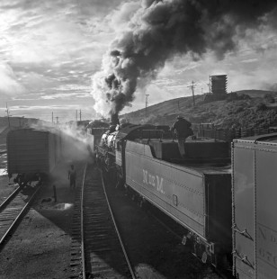 National Railways of Mexico 2-8-2 steam locomotive nos. 2209 (helper) and 2203 (road) with southbound freight climbing the grade up to Zacatecas in the state of Mexico on August 17, 1961. Both are former Nickel Plate locomotives. Rose-01-077-03; Photograph by Ted Rose, © 2015, Center for Railroad Photography and Art