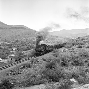 Chihuahua Mineral Company 2-8-0 steam locomotive no. 7 near Chihuahua, State of Chihuahua, Mexico on the way to the smelter at Avalos, Mexico on August 15, 1961. Rose-01-081-08; Photograph by Ted Rose,  © 2015, Center for Railroad Photography and Art