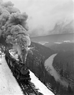 Reading Company Class M1 2-8-2 steam locomotive no. 1752  pulling an 80-car coal train with Class I9 2-8-0 locomotives nos. 1641 and 1644 pushing up Catawissa Creek at McCauley, Pennsylvania, on November 17, 1940. This was the first of three eastbound trains that ran in close succession every Sunday afternoon on the Catawissa Branch. Photograph by Donald W. Furler,  © 2017, Center for Railroad Photography and Art, Furler-03-110-03