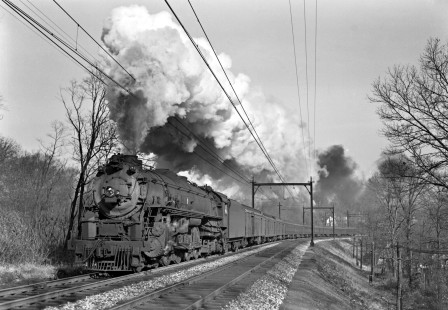 Delaware, Lackawanna and Western Railroad 4-8-4 steam locomotive no. 1502 leads westbound passenger train no. 3, the "Lackawanna Limited," in Summit, New Jersey, on November 24, 1946; Photograph by Donald Furler. Furler-11-111-02.JPG; © 2017, Center for Railroad Photography and Art