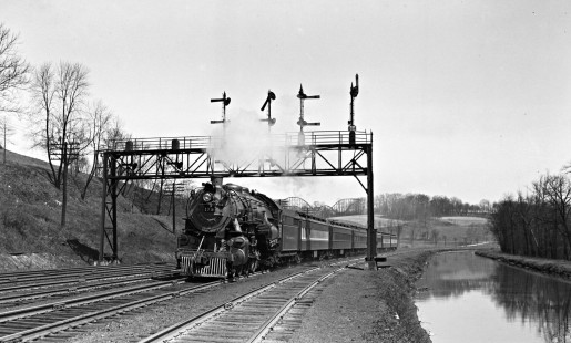 Reading Company, 4-6-2, steam locomotive no. 175, pulling a westbound special passenger train along the Lehigh Coal and Navigation Company canal at Allentown, Pennsylvania, circa 1940. A roller coaster is visible in the background. Photograph by Donald W. Furler, © 2017, Center for Railroad Photography and Art, Furler-24-101-04