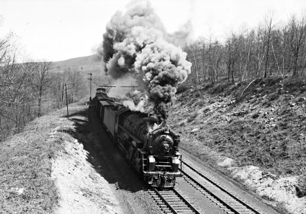 Erie Railroad 2-8-4 steam locomotive no. 3374 pulling a westbound freight train with 70 cars at Otisville, New York, on April 28, 1946. Photograph by Donald W. Furler, © 2017, Center for Railroad Photography and Art, Furler-11-045-02