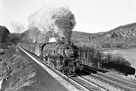 Delaware, Lackawanna and Western Railroad 4-8-4 steam locomotive no. 1501 lead eastbound passenger train no. 2 at cut-off tunnel in Andover, New Jersey, on December 6, 1941. Photograph by Donald Furler. Furler-11-111-01.JPG; © 2017, Center for Railroad Photography and Art