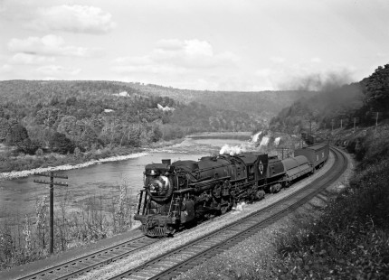 Erie Railroad 4-6-2 steam locomotive no. 2918 leading a westbound passenger train along the Delaware River in Pennsylvania, circa 1950. Photograph by Donald W. Furler, © 2017, Center for Railroad Photography and Art, Furler-20-035-02