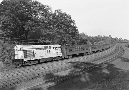 Fairbanks-Morse H-15-44 demonstrator locomotive no. 1502 pulling a westbound Erie Railroad passenger train at Waldwick, New Jersey, circa 1947. Photograph by Donald W. Furler, © 2017, Center for Railroad Photography and Art, Furler-19-078-02