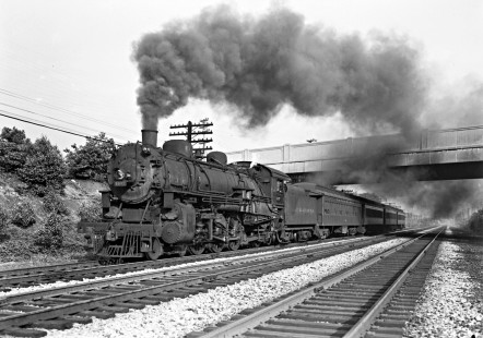 Delaware, Lackawanna and Western Railroad 4-6-2 steam locomotive no. 1107 leads westbound passenger train in Clifton, New Jersey, on July 2, 1946. Photograph by Donald Furler; Furler-11-083-02.JPG; © 2017, Center for Railroad Photography and Art