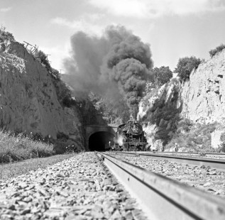 Mexican Railways steam locomotive no. 136 hauls northbound freight through Barrientos Tunnel near Lecheria, Mexico, in August or September of 1961. Rose-01-064-09; Photograph by Ted Rose, © 2015, Center for Railroad Photography and Art