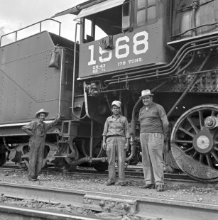 National Railways of Mexico Engineer Edmundo Auendono with others by the cab of NdeM steam locomotive no. 1568 on August 19, 1961. Rose shot this image en route to Irapauto, Guanajaunto, Mexico from Aguascalientes, State of Aguascalientes, Mexico. Rose-01-086-08; Photograph by Ted Rose, © 2015, Center for Railroad Photography and Art