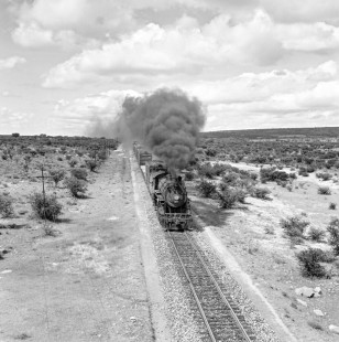 National Railways of Mexico 2-8-0 steam locomotive hauls freight train en route between Aguascalientes and Irapuato on August 19, 1961. Rose-01-071-08; Photograph by Ted Rose,  © 2015, Center for Railroad Photography and Art
