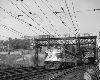 Erie Lackawanna Railroad locomotive no. 831 leads passenger train no. 1413 at West End in Jersey City, New Jersey, on May 26, 1966. Photograph by Victor Hand. Hand-EL-30-107