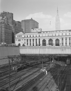 Pennsylvania Railroad GG1 electric locomotive no. 4909 along with New Haven no. 373 at Penn Station in New York City, New York, on June 20, 1965. Photograph by Victor Hand. Hand-PRR-32-044
