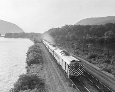 New York Central Railroad Poughkeepsie-Harrison passenger train comprised of five rail diesel cars running along the Hudson River in Cold Spring, New York, on June 22, 1969. Photograph by Victor Hand. Hand-NYC-PC-CR-31-0241.JPG