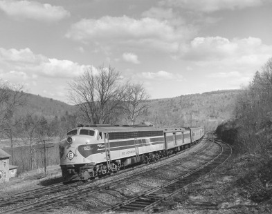 Erie Lackawanna Railroad locomotive no. 823 leads westbound passenger train no. 21 near Pond Eddy, Pennsylvania, on April 15, 1966. Photograph by Victor Hand. Hand-EL-30-089