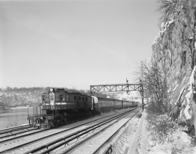 New York Central Railroad electric locomotive no. 2211 with eastbound train no. 16, the "Ohio State Limited," in Marble Hill, New York, on December 1, 1967. Photograph by Victor Hand. Hand-NYC-PC-CR-31-0104