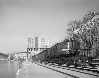 New York Central Railroad electric locomotive no. 223 leads train no. 6E, the "Cleveland Limited," in Marble Hill, New York, on December 1, 1967. Photograph by Victor Hand. Hand-NYC-PC-CR-31-0103