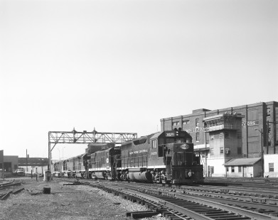 New York Central diesel locomotive no. 3029 leads an eastbound freight in Rochester, New York, on March 27, 1968. Photograph by Victor Hand. Hand-NYC-PC-CR-31-0149.JPG