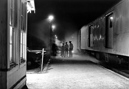 A few people gathered at Thedford, Nebraska, in August 1969 to observe a time-honored ritual, the passing of the Chicago, Burlington & Quincy's night passenger train, one that made most local stops between Billings and Omaha and was in its last month of operation.