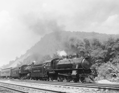 Pennsylvania Railroad steam locomotives nos. 7002 and 1223 leading excursion train near Rockville, Pennsylvania, on June 8, 1985. Photograph by Victor Hand. Hand-NYC-PC-CR-31-0873