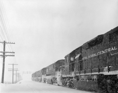 New York Central Railroad locomotives no. 2504 and no. 3044 with westbound freight train in Batavia, New York, on January 23, 1966. Photograph by Victor Hand. Hand-NYC-PC-CR-31-0043