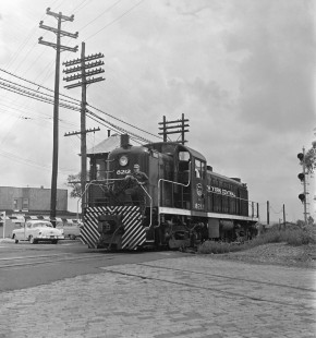 New York Central Railroad locomotive no. 8212 and worker in Little Ferry, New Jersey, in 1957. Photograph by Victor Hand. Hand-NYC-PC-CR-X31-001.jpg