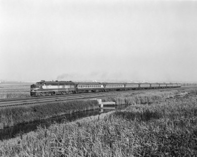 Erie Lackawanna Railroad diesel locomotive no. 862 leads passenger train no. 59 near Rutherford, New Jersey on July 21, 1965; Photograph by Victor Hand. Hand-EL-30-068.JPG.
