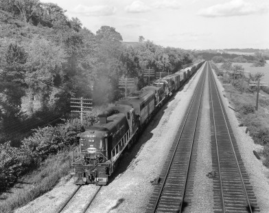 New York Central Railroad diesel locomotive no. 5341 hauls  westbound freight in Fonda, New York, on September 16, 1967. Photograph by Victor Hand. Hand-NYC-PC-CR-31-0084.JPG