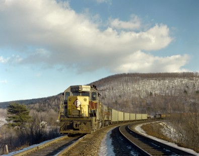 Erie Lackawanna Railroad diesel locomotive no. 2574, leads an eastbound freight train near Lanesboro, Pennsylvania on January 21, 1968; Photograph by Victor Hand. Hand-EL-C30-017.JPG