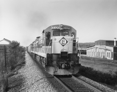 Erie Lackawanna Railway diesel locomotive no. 3320 hauls eastbound freight in Greenvile, Pennsylvania, on August 3, 1973; Photograph by Victor Hand; Hand-EL-30-171