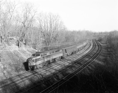 Erie Lackawanna Railroad locomotive no. 854 leads a passenger train through the s-curve at Waldwick, New Jersey, on April 14, 1965; Photograph by Victor Hand. Hand-EL-30-036.JPG