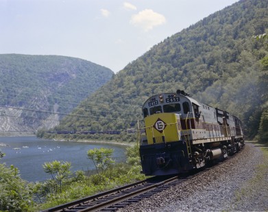 Erie Lackawanna Railroad diesel locomotive no. 2457 leads a freight train at Delaware Water Gap, Pennsylvania, on June 20, 1965;  Photograph by Victor Hand. Hand-EL-C30-009
