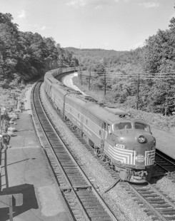 New York Central Railroad diesel locomotive no. 4093 leads eastbound passenger train, "The Mohawk" in Crugers, New York, on June 13, 1963. Photograph by Victor Hand. Hand-NYC-PC-CR-31-0004