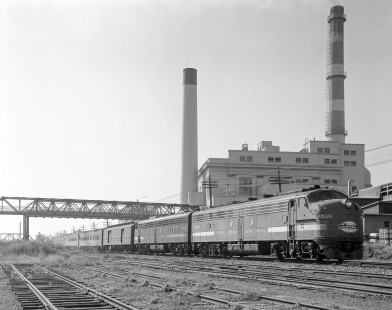 New York Central Railroad diesel locomotive no. 4070 leads  eastbound passenger train no. 50, the "Empire State Express," in Rochester, New York, on September 14, 1967. Photograph by Victor Hand. Hand-NYC-PC-CR-31-0079