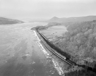 New York Central Railroad diesel locomotive no. 4022 leads the eastbound World's Fair Special train no. 40 near Bear Mountain, New York, on February 28, 1965. Photograph by Victor Hand. Hand-NYC-PC-CR-31-0026