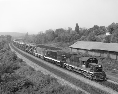 New York Central Railroad diesel locomotive no. 2026 leads an eastbound auto train in Palmyra, New York, on September 18, 1967. Photograph by Victor Hand. Hand-NYC-PC-CR-31-0086.JPG