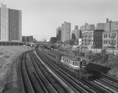 New York Central Railroad electric locomotive no. 224 with passenger train no. 946 in Mott Haven neighborhood in New York, New York, on August 12, 1968. Photograph by Victor Hand. Hand-NYC-PC-CR-31-0180