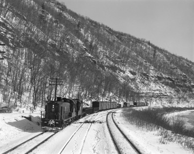 Pennsylvania Railroad diesel locomotive no. 8592 hauls westbound freight in Cameron, Pennsylvania, on January 25, 1966. Photograph by Victor Hand. Hand-PRR-32-072
