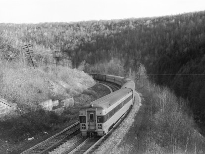 The back end and observation car of Erie Lackawanna Railroad passenger train no. 2, the eastbound "Phoebe Snow," near Nay Aug, Pennsylvania, on November 15, 1966; Photograph by Victor Hand.; Hand-EL-30-123