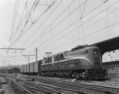 Pennsylvania Railroad GG1 electric locomotive no. 4918 with eastbound passenger train no. 148, the <i>Silver Comet,</i> in Washington D.C., on July 5, 1965. Photograph by Victor Hand. Hand-PRR-32-050
