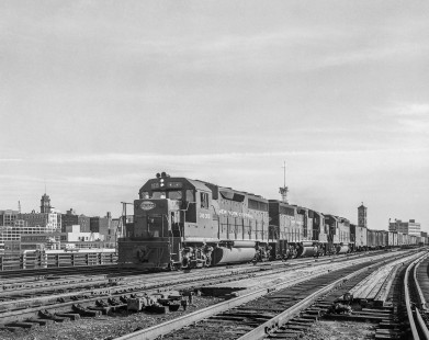 New York Central Railroad diesel locomotive no. 3035  with eastbound freight in Rochester, New York, on July 23, 1968. Photograph by Victor Hand. Hand-NYC-PC-CR-31-0172.JPG