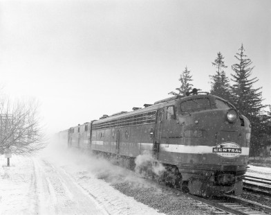New York Central diesel locomotive no. 4042 leads passenger train no. 72  in Chili, New York, on January 24, 1968. Photograph by Victor Hand. Hand-NYC-PC-CR-31-0116