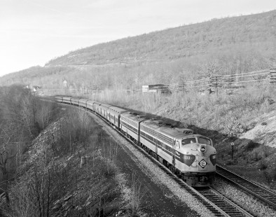 Erie Lackawanna Railroad locomotive no. 833 leads passenger train no. 2, the eastbound "Phoebe Snow," near Nay Aug, Pennsylvania, November 15, 1966; Photograph by Victor Hand. Pennsylvania, United States; Hand-EL-30-122