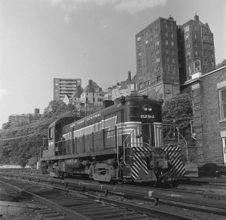 New York Central diesel locomotive no. 8294 in Spuyten Duyvil neighborhood, in New York City, New York, in 1962. Photograph by Victor Hand. Hand-NYC-PC-CR-X31-025