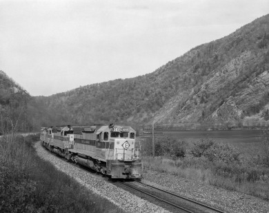 Erie Lackawanna Railway diesel locomotive no. 3604 leads a freight train at the Delaware Water Gap in Monroe County, Pennsylvania, on October 26th 1974; Photograph by Victor Hand. Hand-EL-30-176