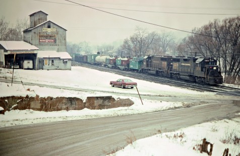 Eastbound Penn Central freight train with helpers in Lucas, Ohio, on January 25, 1976. Photograph by John F. Bjorklund, © 2016, Center for Railroad Photography and Art. Bjorklund-80-03-14