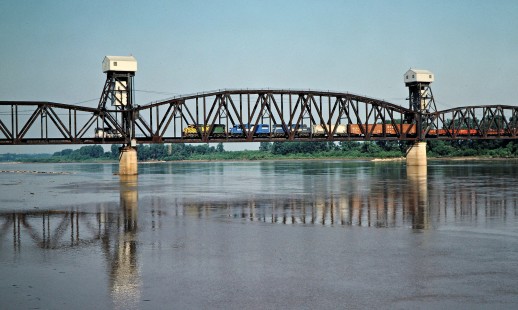 Westbound Missouri–Kansas–Texas Railroad freight train crossing Missouri River in Boonville, Missouri, on July 12, 1981. Photograph by John F. Bjorklund, © 2016, Center for Railroad Photography and Art. Bjorklund-70-05-06